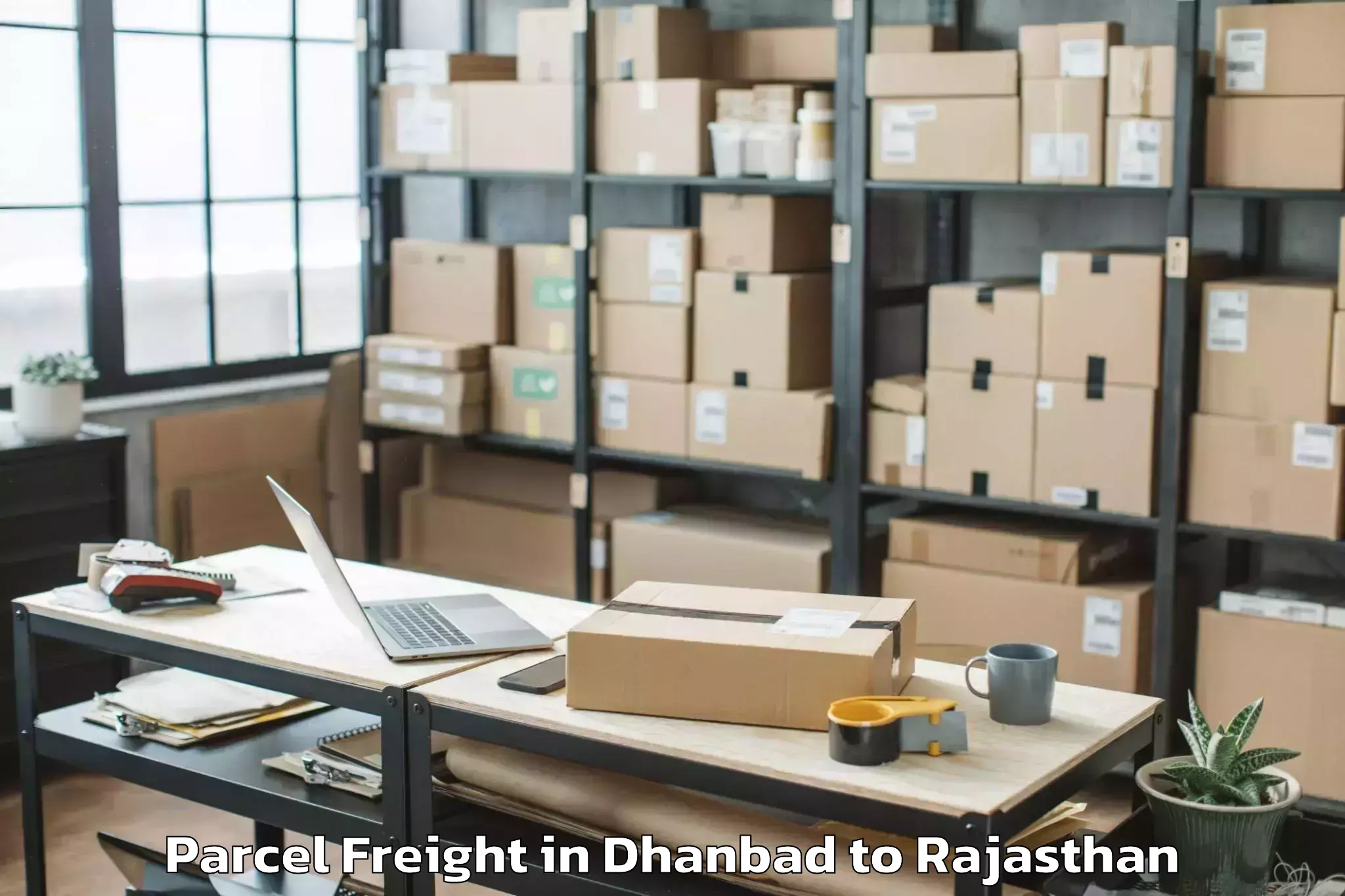 Hassle-Free Dhanbad to Jamwa Ramgarh Parcel Freight